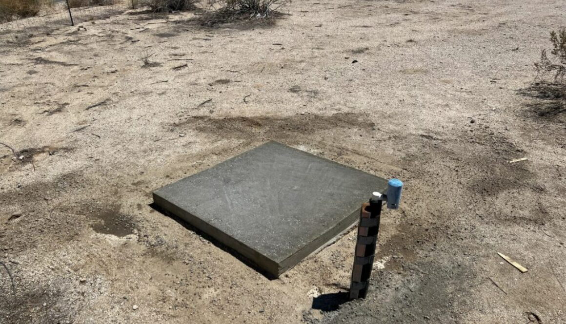 Dry Pouring a Concrete Slab for a New Shed in the Desert During the Height of Summer